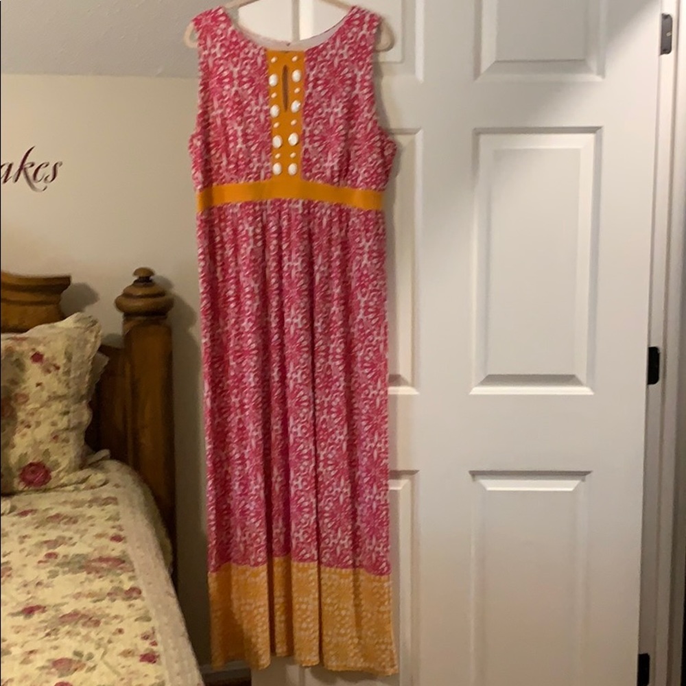 This dress has been worn just a couple of times.